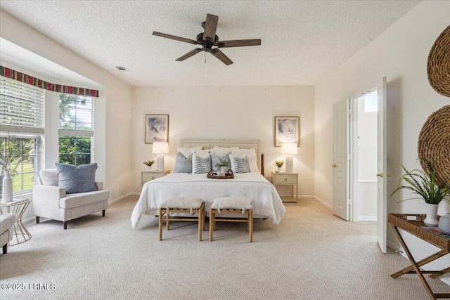 6 Pinyon Dr, Bluffton, SC 29909 - bedroom featuring light colored carpet, a textured ceiling, baseboards, and ceiling fan