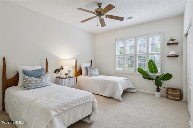 6 Pinyon Dr, Bluffton, SC 29909 - carpeted bedroom with ceiling fan, a textured ceiling, and baseboards