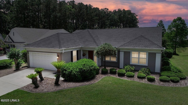 6 Pinyon Dr, Bluffton, SC 29909 - ranch-style home featuring a garage, a yard, concrete driveway, roof with shingles, and stucco siding