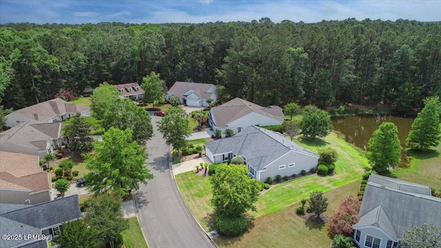 6 Pinyon Dr, Bluffton, SC 29909 - aerial view of residential area with a heavily wooded area and a large body of water