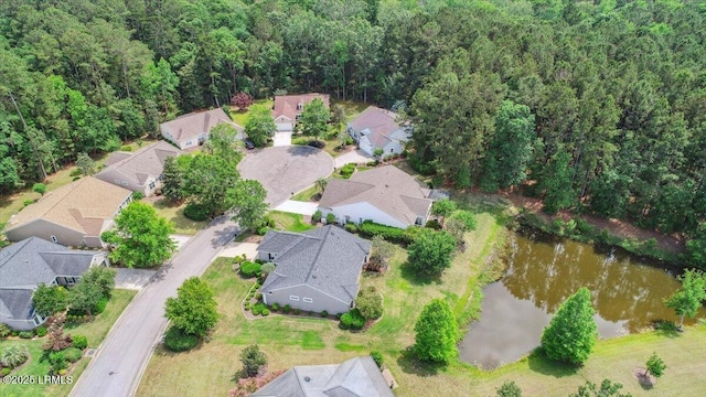 6 Pinyon Dr, Bluffton, SC 29909 - aerial overview of property's location with nearby suburban area, a nearby body of water, and a forest