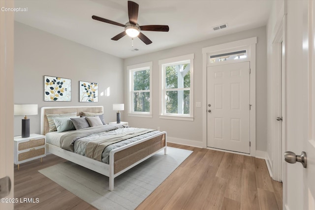 425 Parkside Commons, Bluffton, SC 29910 - bedroom with light wood-style floors and a ceiling fan