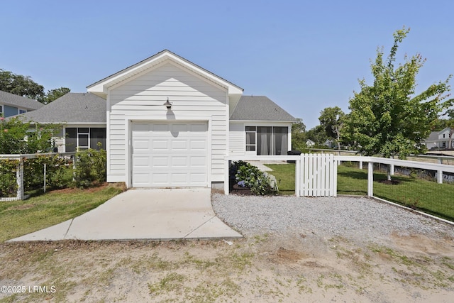 11 Basin Trail St, Beaufort, SC 29902 - ranch-style house with a garage, concrete driveway, a shingled roof, and a gate