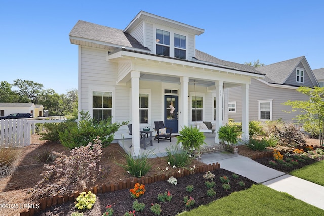 11 Basin Trail St, Beaufort, SC 29902 - view of front of house featuring a porch and a shingled roof