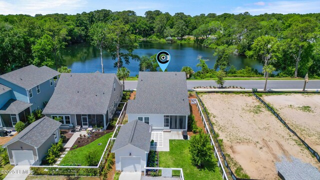 11 Basin Trail St, Beaufort, SC 29902 - view of front facade with a porch, a front lawn, and roof with shingles