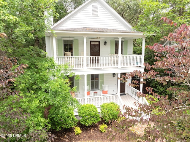 14 Fraser St, Beaufort, SC 29907 - view of front of home with covered porch, a balcony, and a shingled roof