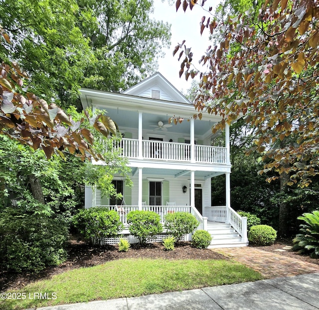 14 Fraser St, Beaufort, SC 29907 - view of front facade featuring a porch, a balcony, and ceiling fan