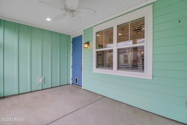 view of patio / terrace with ceiling fan and a porch