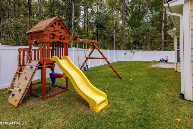 view of jungle gym featuring a yard