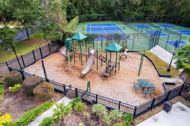 view of jungle gym with tennis court