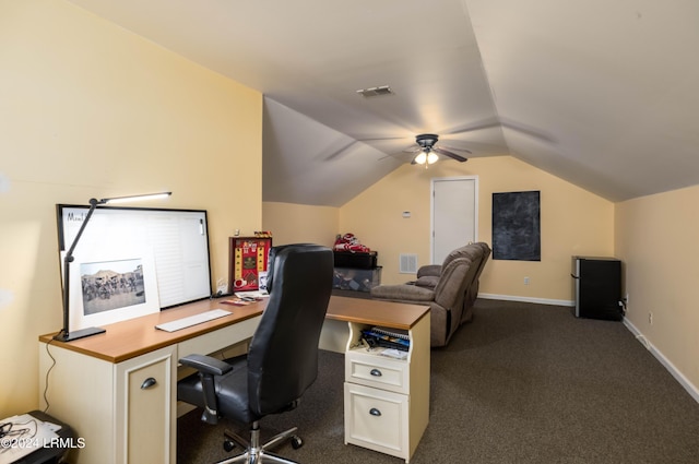 carpeted home office featuring vaulted ceiling and ceiling fan