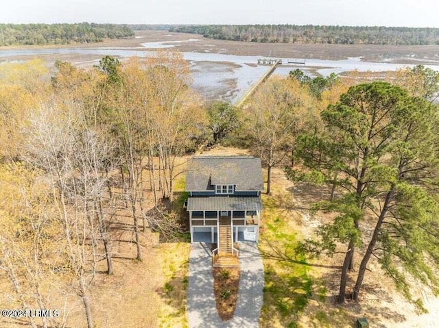 drone / aerial view with a water view