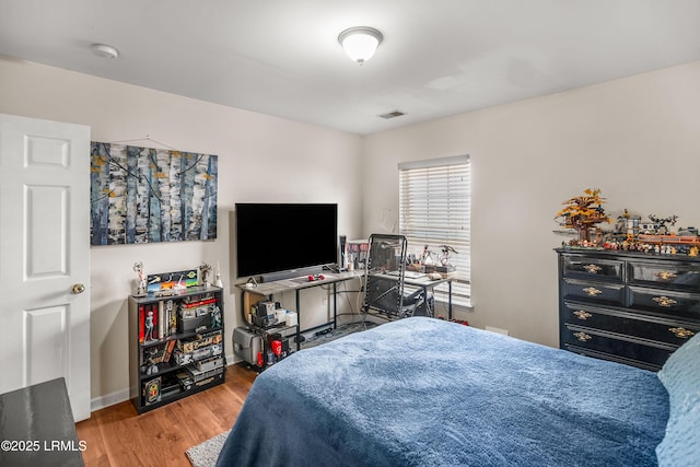 2 Waccamaw Way, Beaufort, SC 29906 - bedroom with wood finished floors and baseboards