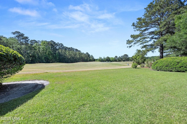 122 Island W Dr, Bluffton, SC 29910 - exterior space featuring a lawn and golf course view