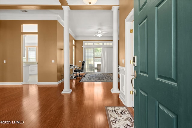 122 Island W Dr, Bluffton, SC 29910 - entryway with crown molding, a ceiling fan, wood finished floors, and ornate columns