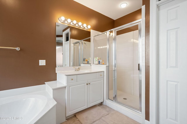 122 Island W Dr, Bluffton, SC 29910 - bathroom with a garden tub, tile patterned floors, a stall shower, and vanity