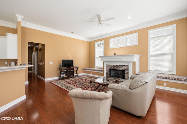 122 Island W Dr, Bluffton, SC 29910 - living room featuring dark wood-style flooring, crown molding, baseboards, and ceiling fan