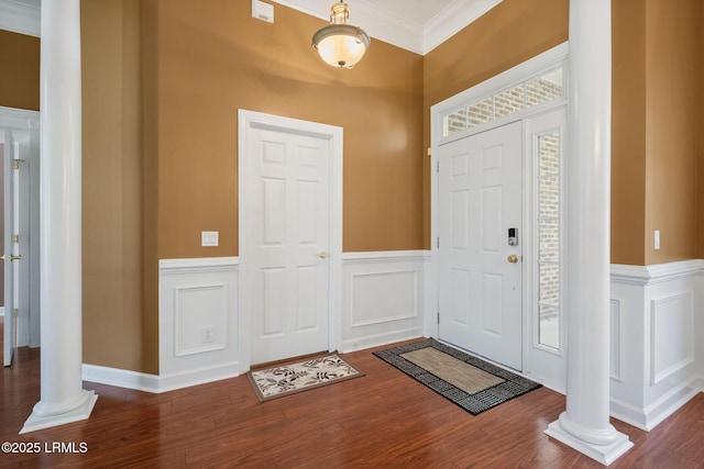 122 Island W Dr, Bluffton, SC 29910 - foyer entrance featuring a decorative wall, crown molding, wood finished floors, wainscoting, and ornate columns