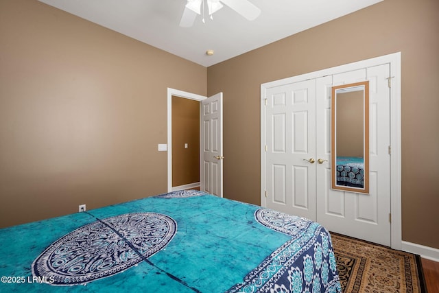 122 Island W Dr, Bluffton, SC 29910 - bedroom featuring baseboards, a ceiling fan, wood finished floors, and a closet