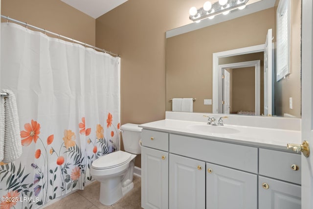 122 Island W Dr, Bluffton, SC 29910 - bathroom featuring a shower with shower curtain, tile patterned flooring, vanity, and toilet