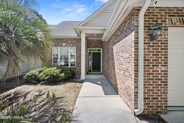 122 Island W Dr, Bluffton, SC 29910 - entrance to property with a shingled roof and brick siding