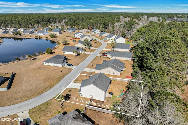 aerial view featuring a residential view and a water view