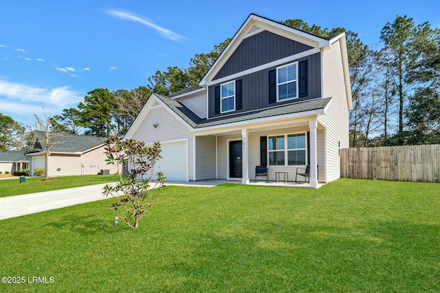 traditional-style home with covered porch, fence, concrete driveway, board and batten siding, and a front yard