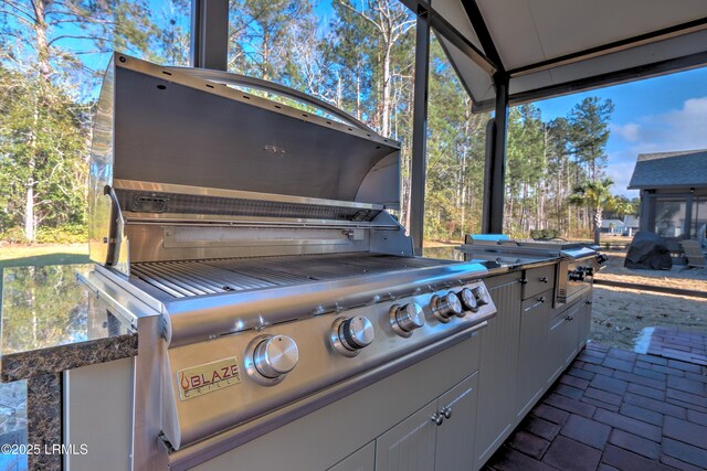 54 Slash Pine Dr, Okatie, SC 29909 - view of patio featuring exterior kitchen and a grill