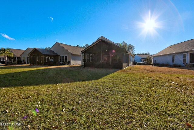 54 Slash Pine Dr, Okatie, SC 29909 - exterior space with a lawn and a sunroom