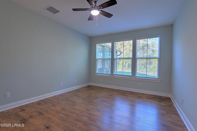 54 Slash Pine Dr, Okatie, SC 29909 - empty room featuring a ceiling fan, baseboards, visible vents, and wood finished floors