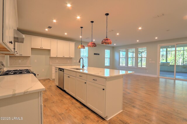 54 Slash Pine Dr, Okatie, SC 29909 - kitchen featuring decorative backsplash, a sink, light wood finished floors, stainless steel appliances, and recessed lighting