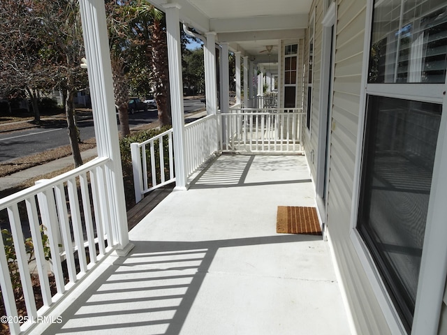 balcony featuring covered porch