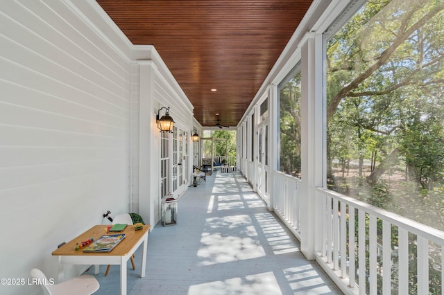 office area featuring ornamental molding, carpet, and baseboards