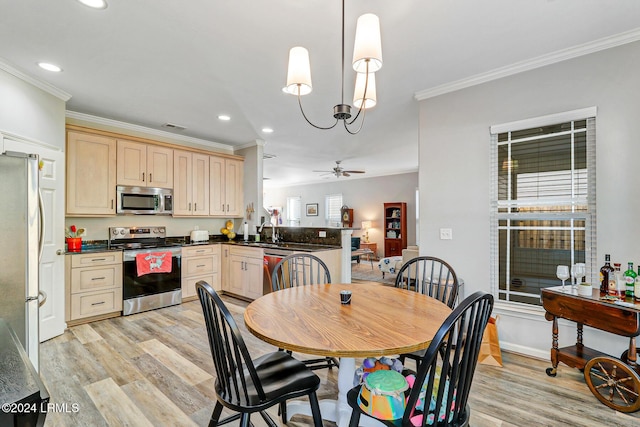 dining area featuring recessed lighting, ornamental molding, visible vents, and light wood-type flooring