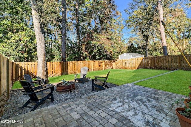 view of patio / terrace featuring a fire pit