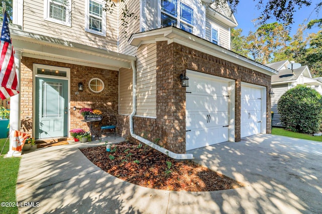 property entrance with a garage