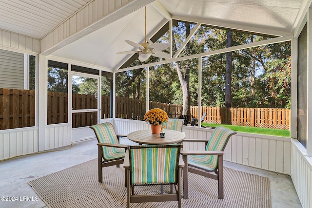 sunroom / solarium featuring vaulted ceiling and ceiling fan