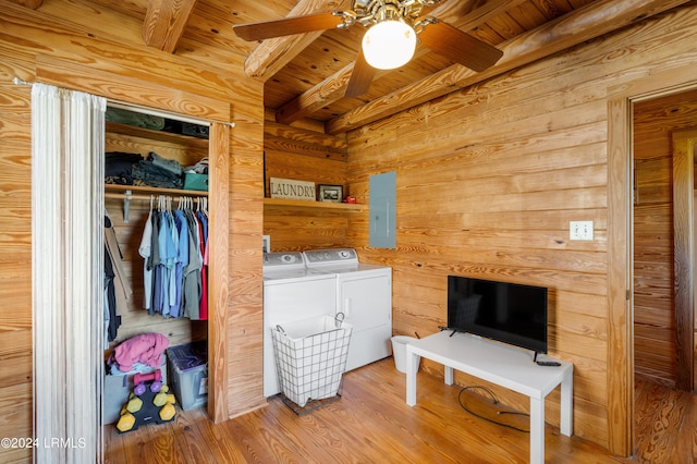 interior space with washing machine and dryer and electric panel