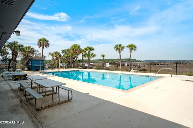 view of pool with a patio