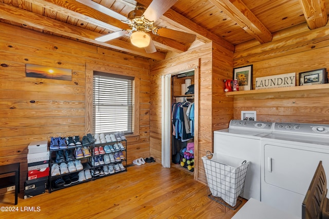 washroom featuring washing machine and dryer, wooden ceiling, ceiling fan, and light hardwood / wood-style flooring