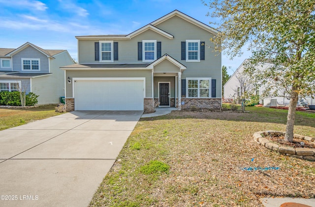 view of front of house with an attached garage, a front lawn, concrete driveway, and brick siding