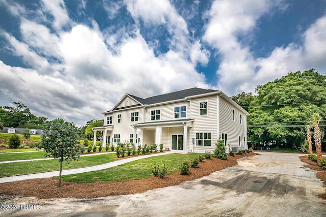 view of front of house with a front lawn