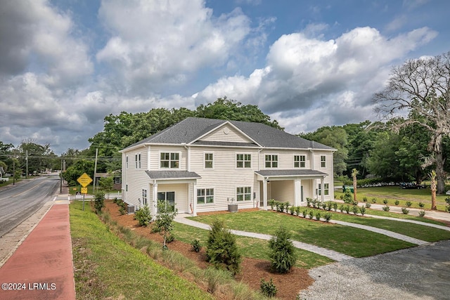 view of front of house with a front lawn