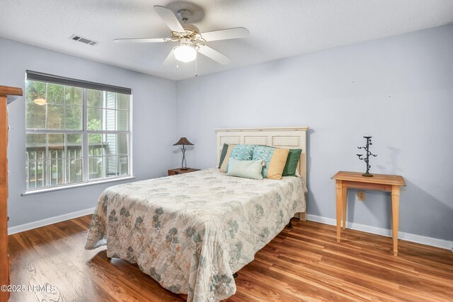 1231 Ladys Island Dr Unit 327, Port Royal, SC 29935 - bedroom featuring wood finished floors and a ceiling fan