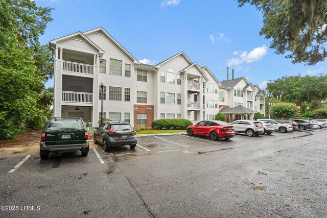 1231 Ladys Island Dr Unit 327, Port Royal, SC 29935 - view of property featuring uncovered parking and a residential view