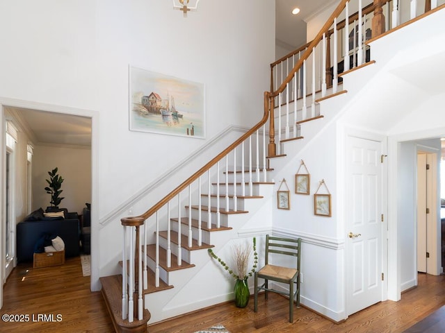 31 Hearthwood Dr, Hilton Head Island, SC 29928 - stairs featuring a towering ceiling, crown molding, and wood finished floors