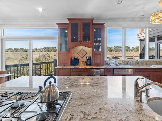 31 Hearthwood Dr, Hilton Head Island, SC 29928 - kitchen featuring a sink, light stone countertops, and ornamental molding