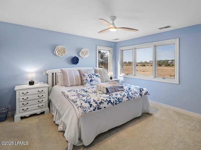 31 Hearthwood Dr, Hilton Head Island, SC 29928 - carpeted bedroom featuring baseboards, visible vents, and a ceiling fan