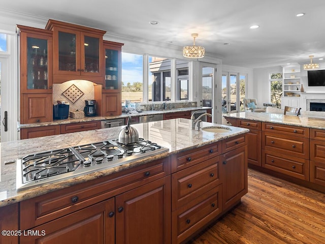 31 Hearthwood Dr, Hilton Head Island, SC 29928 - kitchen featuring open floor plan, a sink, a healthy amount of sunlight, and appliances with stainless steel finishes