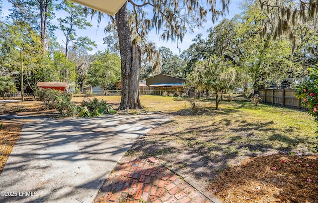 view of yard with fence